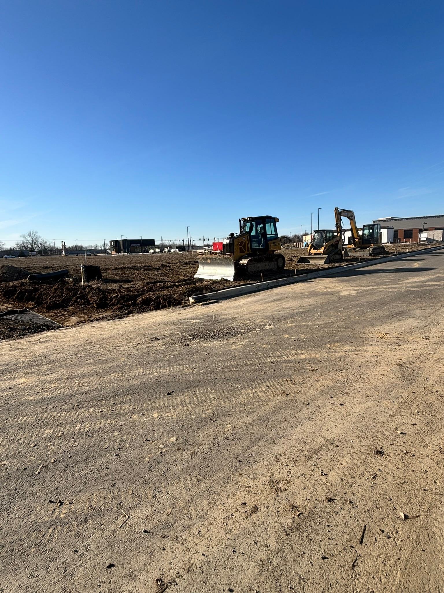 BD Excavation equipment and prepared base on a commercial site