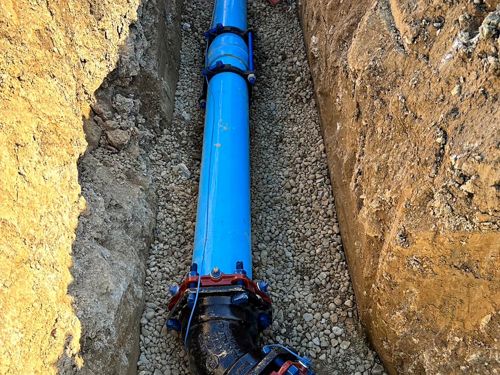 C900 water main with restrained joints installed in trench